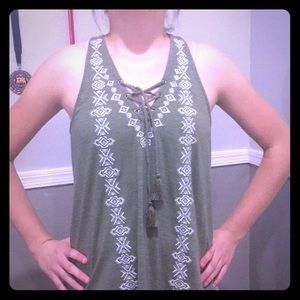 A green tank top pattern shirt